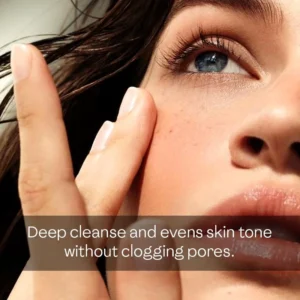 Woman with smooth complexion demonstrating deep cleansing cream face wash benefits for evening skin tone without clogging pores