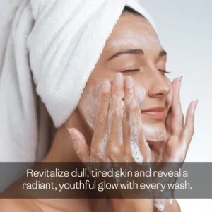 Woman washing face with gentle lather to revitalize dull tired skin — a face wash for dark spots and hyperpigmentation that reveals a radiant youthful glow with every wash