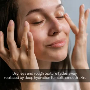 Woman touching soft hydrated face after using gold skincare set — dryness and rough texture fades away replaced by deep hydration for smooth skin