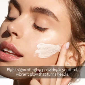 Woman applying face cream on cheek to remove pigmentation and achieve a youthful vibrant glow naturally at home