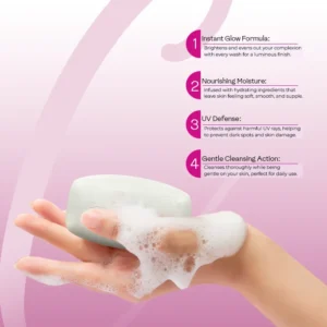 Hand holding lathered Face Fresh natural skin brightening soap with key benefits — instant glow formula, nourishing moisture, UV defense, and gentle cleansing action