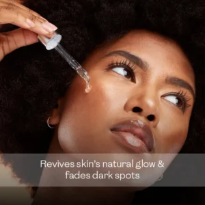 Woman applying hydrating beauty serum with dropper to revive skin's natural glow and fade dark spots — a k-beauty skin repair serum for radiant complexion