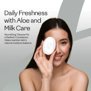 Smiling woman holding Easy Fresh milk soap bar — a nourishing aloe and milk moisturizer soap that maintains skin's natural moisture balance