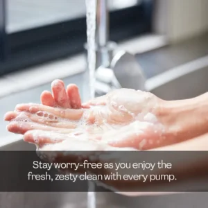 Hands lathering hand wash under running water for zesty clean germ protection
